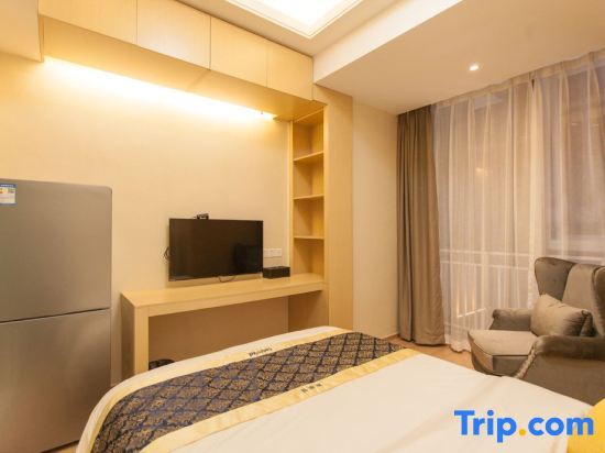 Янчжоу: Sweetome Boutique Apartment (Yangzhou Railway Station Jinghua City)