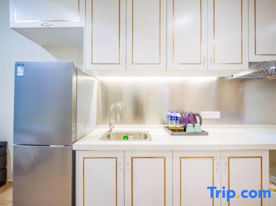 Янчжоу: Sweetome Boutique Apartment (Yangzhou Railway Station Jinghua City)