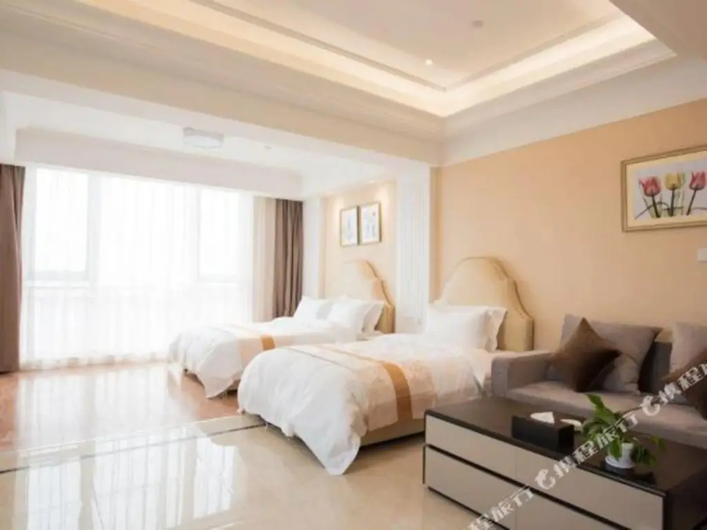 Янчжоу: Baiya Light Luxury Holiday Apartment (Yangzhou Railway Station Jinghuacheng Branch)