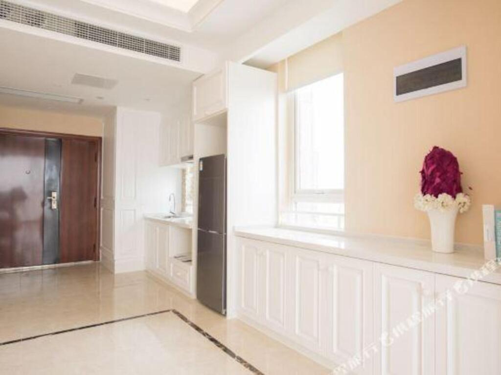 Янчжоу: Baiya Light Luxury Holiday Apartment (Yangzhou Railway Station Jinghuacheng Branch)