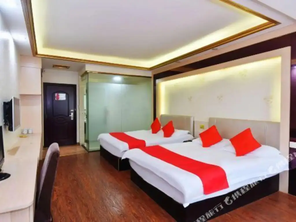 Wanlong Business Hotel — фото 1