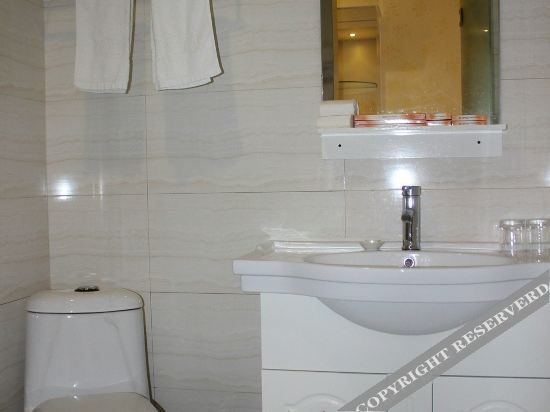 Синьюй: Xinyu Hong Shanghui Hotel