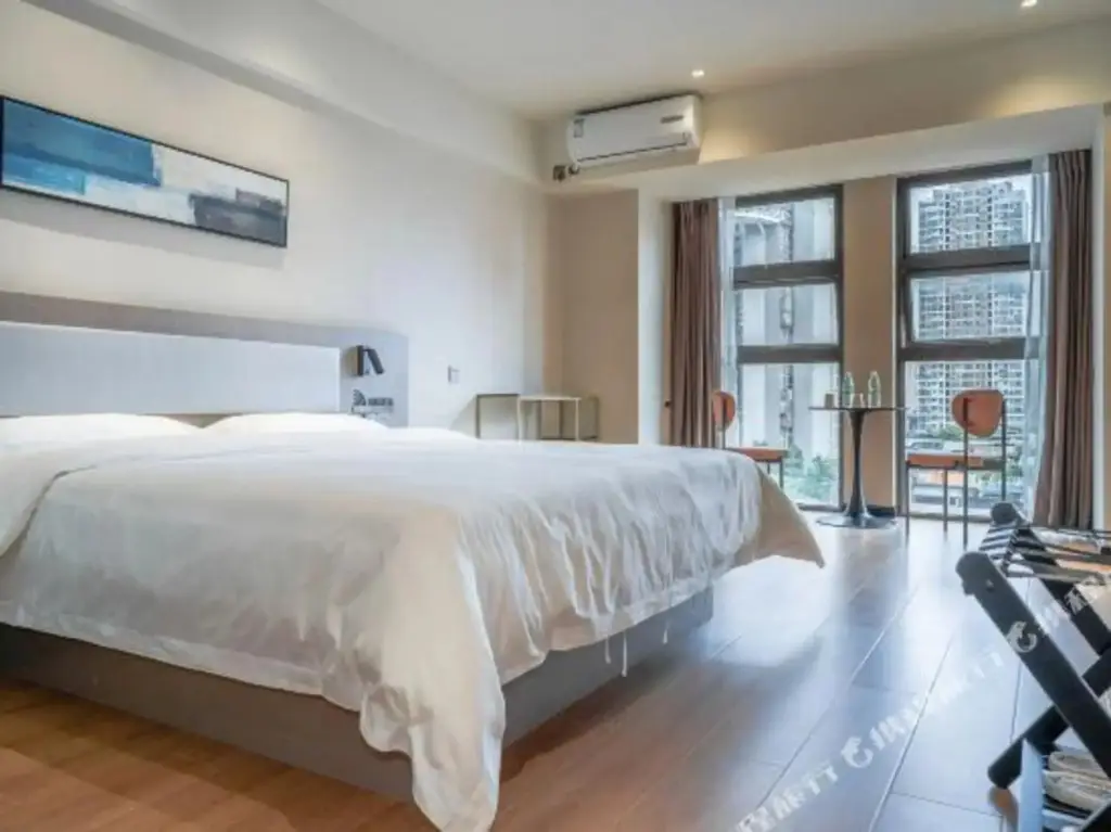 Чунцин: Chongqing Tianjie Xiaowo Apartment