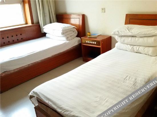 Куча: Kuqa Qiangxin Guest House