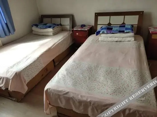 Циндао: Xin'aoda Hostel