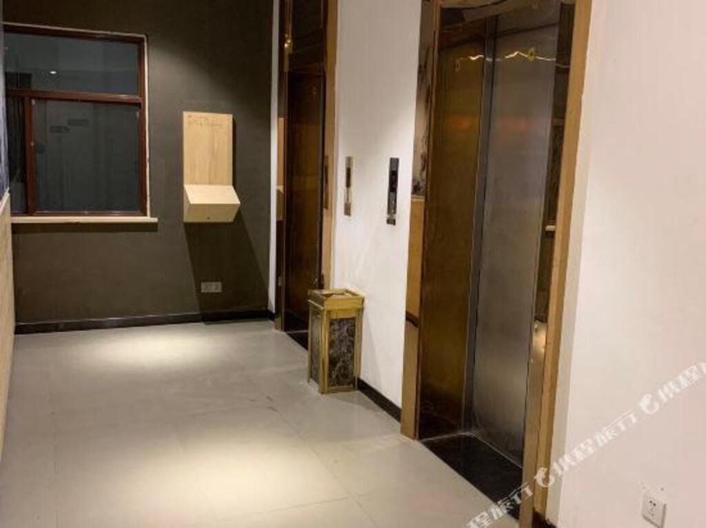 Циндао: Qingdao Wanyi Youpin Hotel