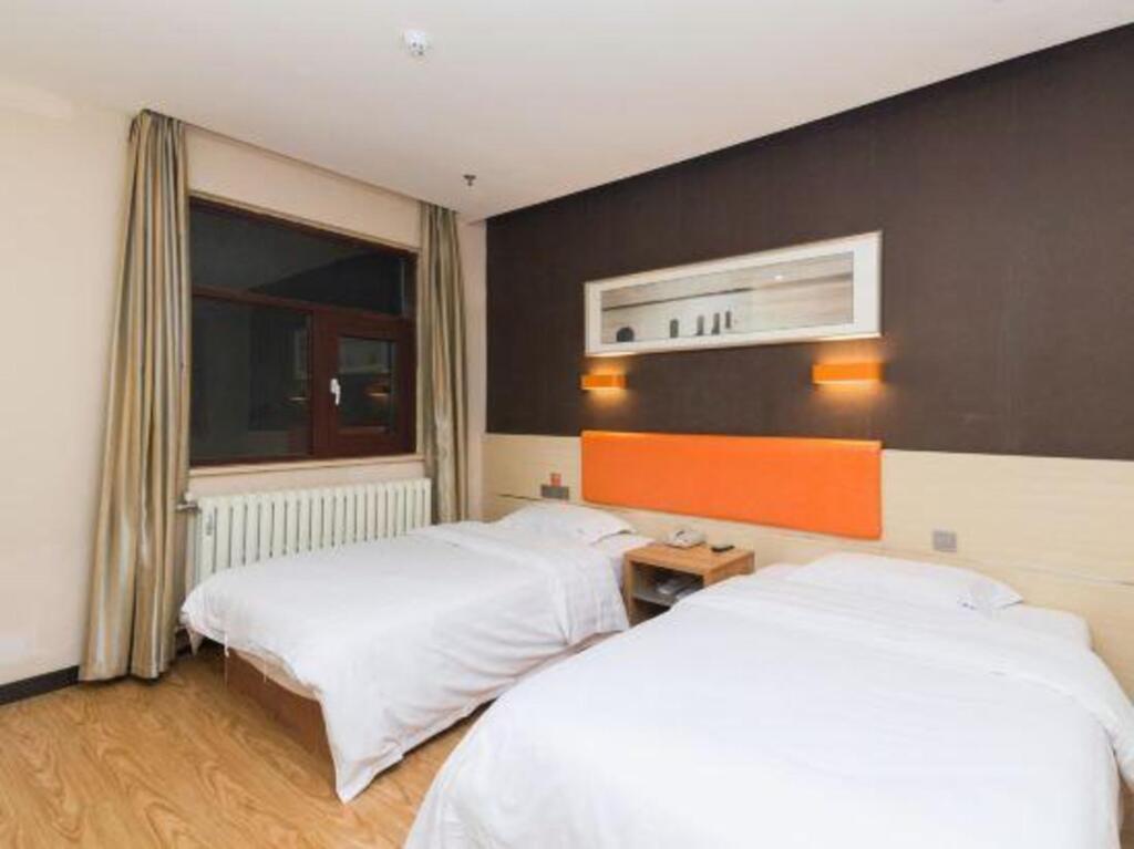 Циндао: Qingdao Wanyi Youpin Hotel