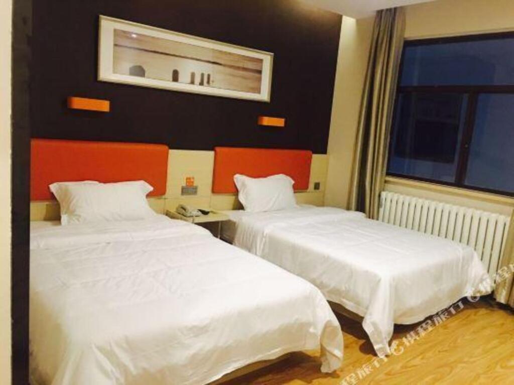 Циндао: Qingdao Wanyi Youpin Hotel