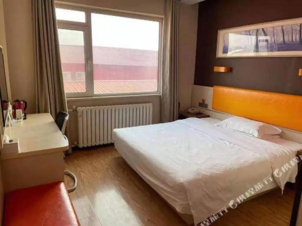 Циндао: Qingdao Wanyi Youpin Hotel