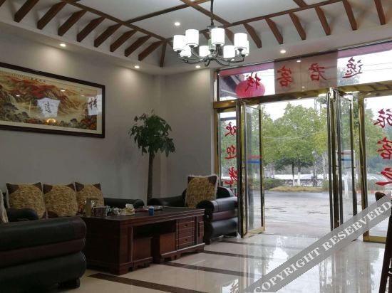 Синьюй: Xinyu Yijun Hotel
