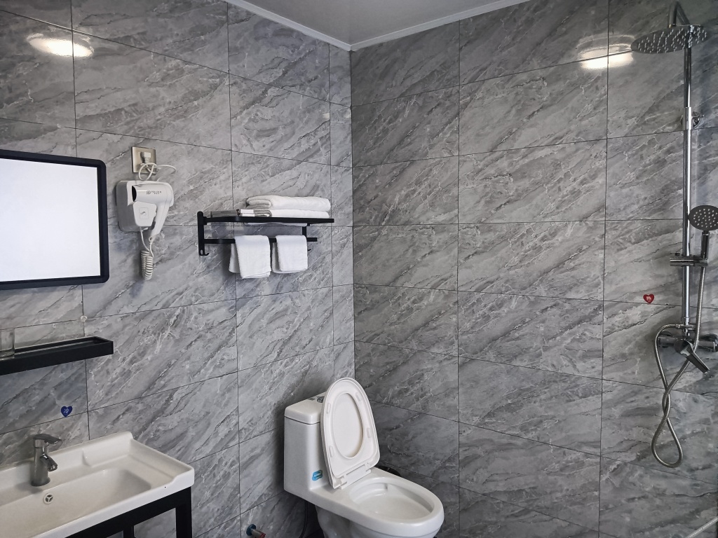 Цзинань: Dexin Express Hotel (Zhangqiu Harmony Plaza)