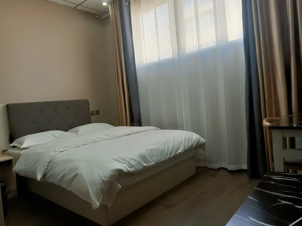 Цзинань: Dexin Express Hotel (Zhangqiu Harmony Plaza)