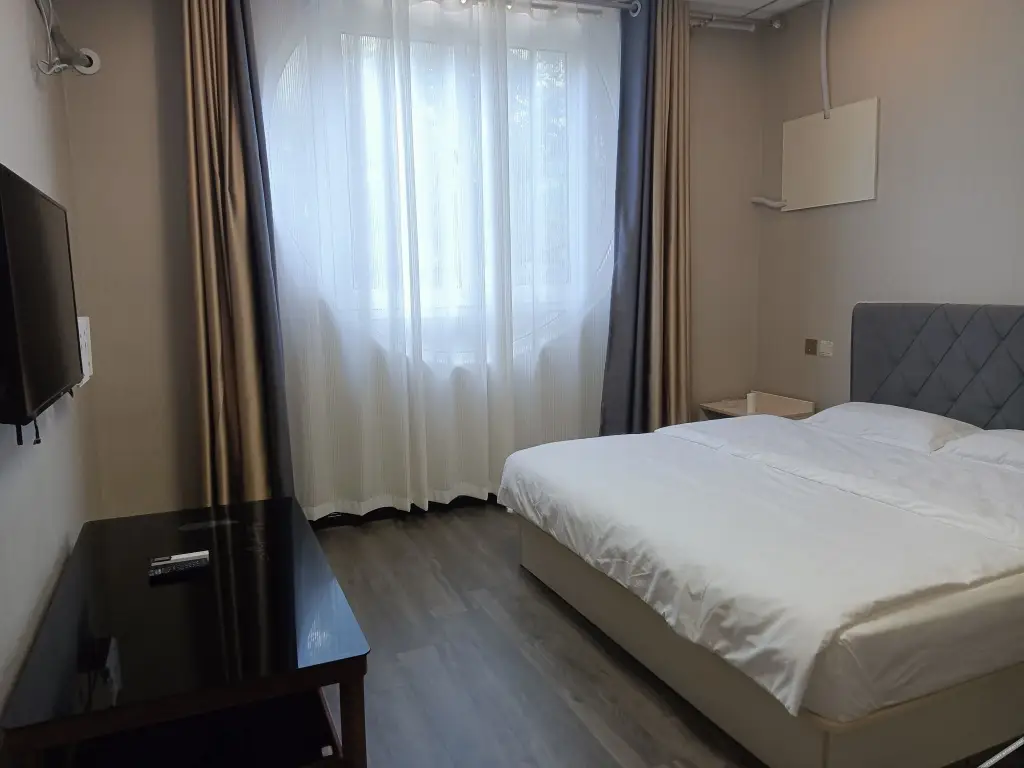 Цзинань: Dexin Express Hotel (Zhangqiu Harmony Plaza)