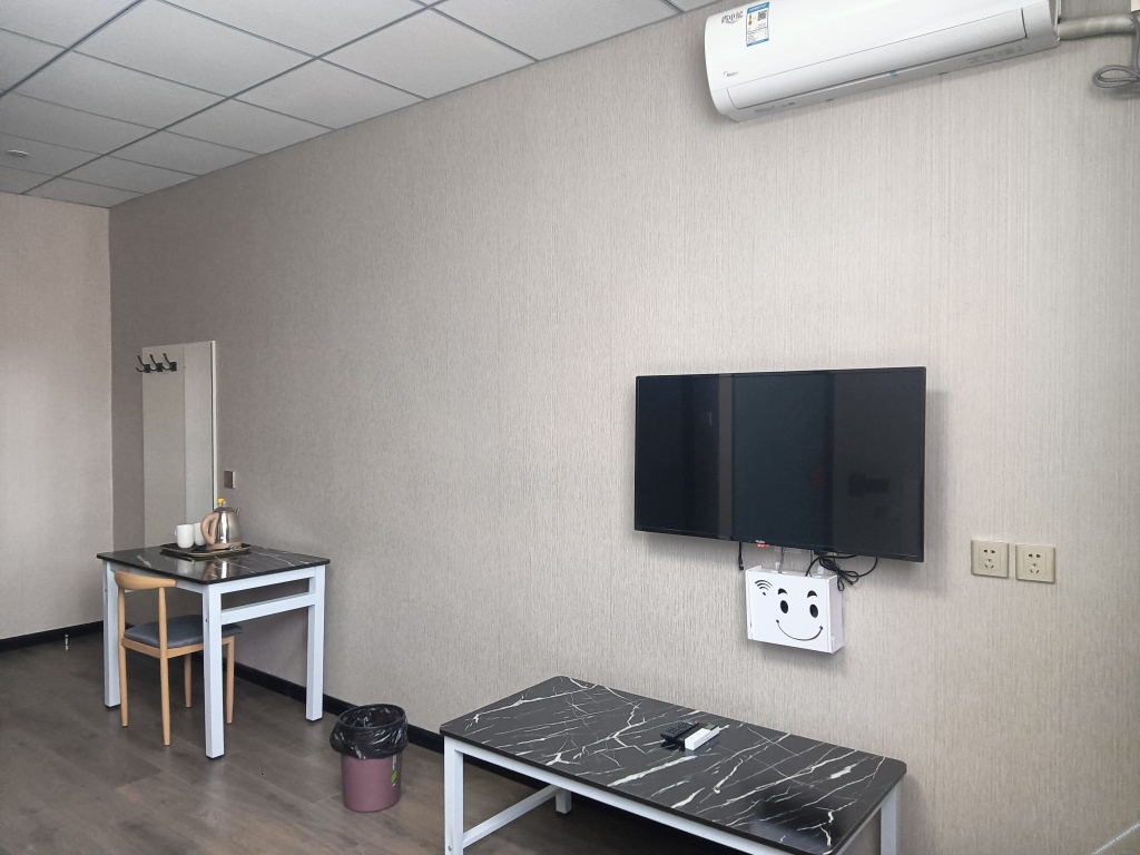 Цзинань: Dexin Express Hotel (Zhangqiu Harmony Plaza)