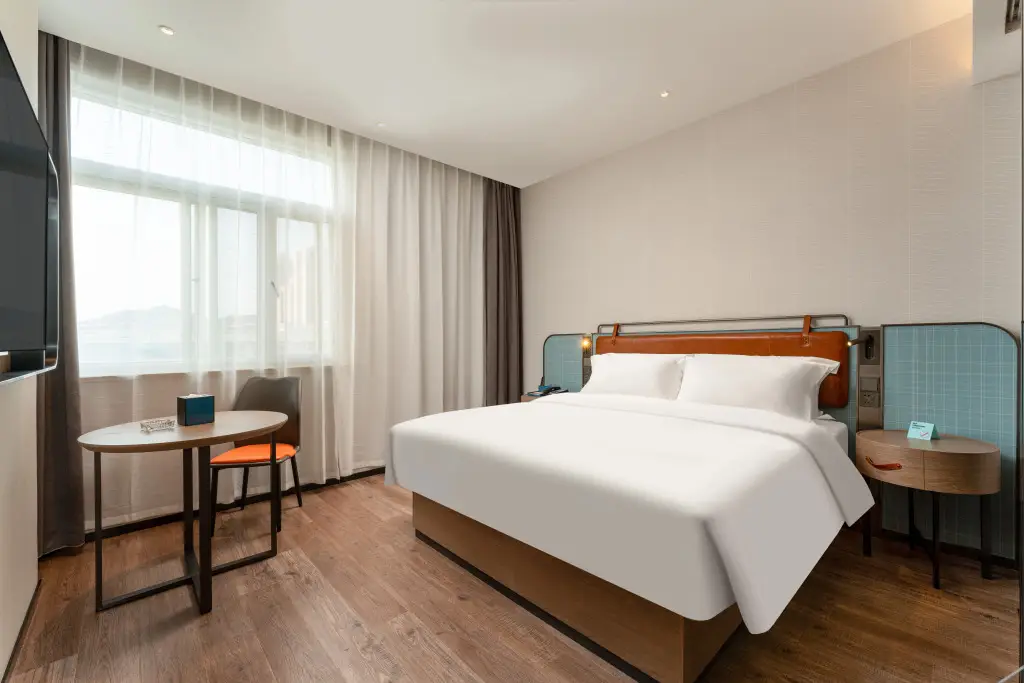 Яньтай: Echarm Hotel Yantai Huangwu Center Red Star Macalline