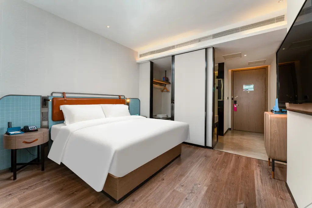Яньтай: Echarm Hotel Yantai Huangwu Center Red Star Macalline