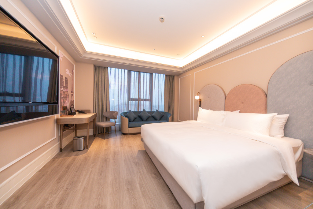 Синьян: Meiju Hotel Xinyang East Station