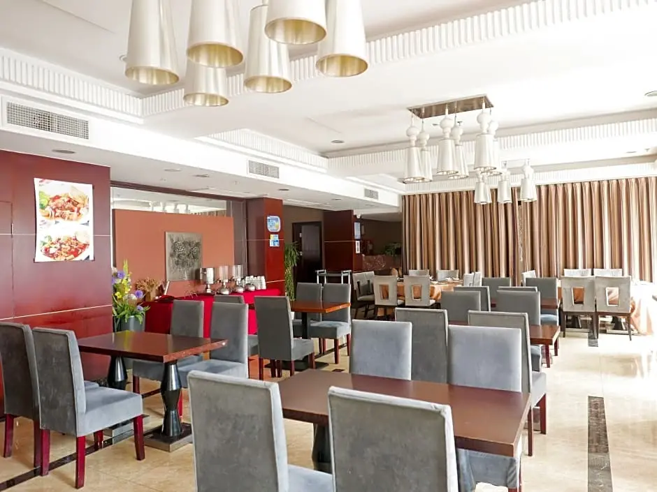 Шанхай: New Century Manju Hotel Shanghai Railway Station