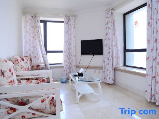 Далянь: Xiaisi Lexiang Service Apartment (Dalian Xinghai Square)