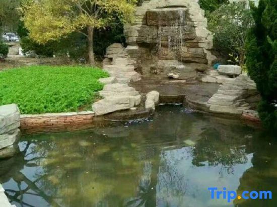 Далянь: Xiaisi Lexiang Service Apartment (Dalian Xinghai Square)