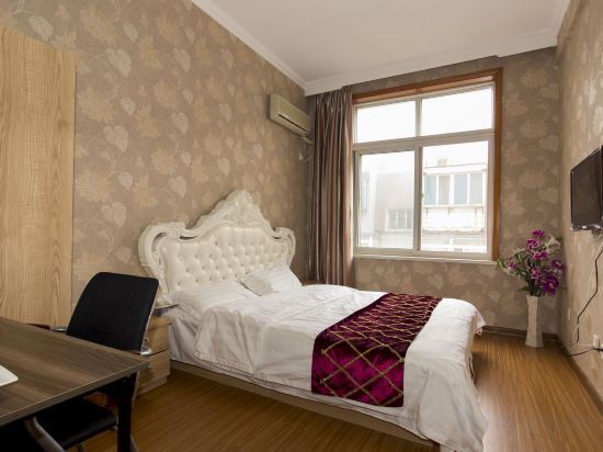 Далянь: Xiaisi Lexiang Service Apartment (Dalian Xinghai Square)