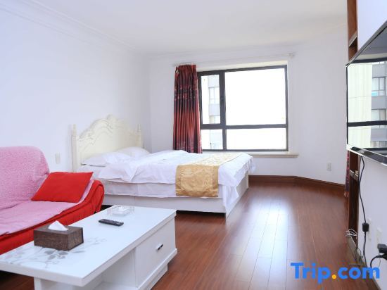 Далянь: Xiaisi Lexiang Service Apartment (Dalian Xinghai Square)