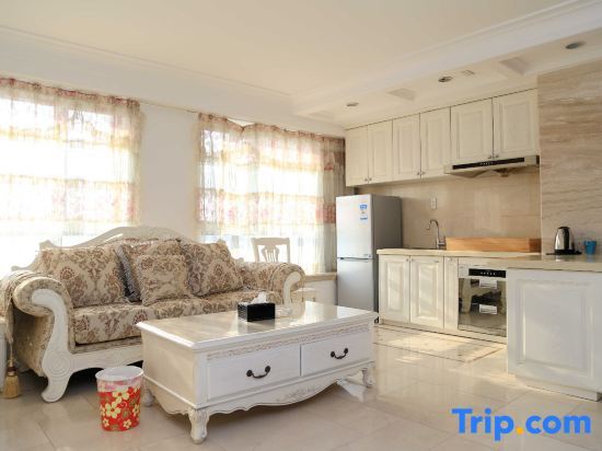 Далянь: Xiaisi Lexiang Service Apartment (Dalian Xinghai Square)