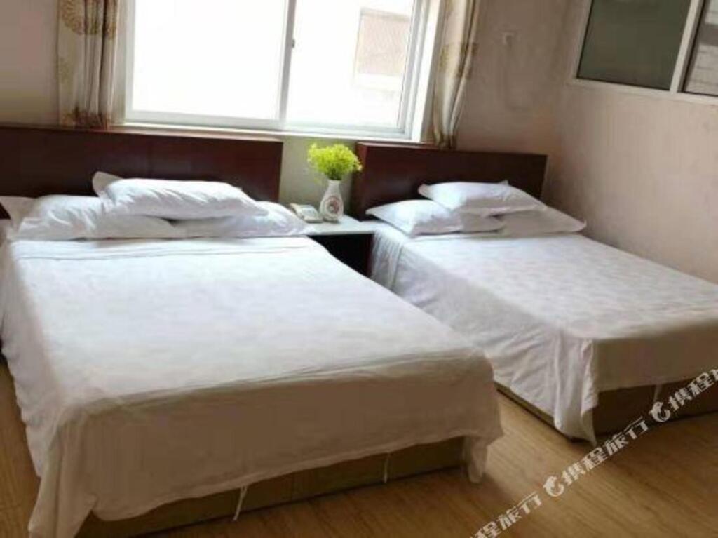 Циндао: Shengji Business Hotel
