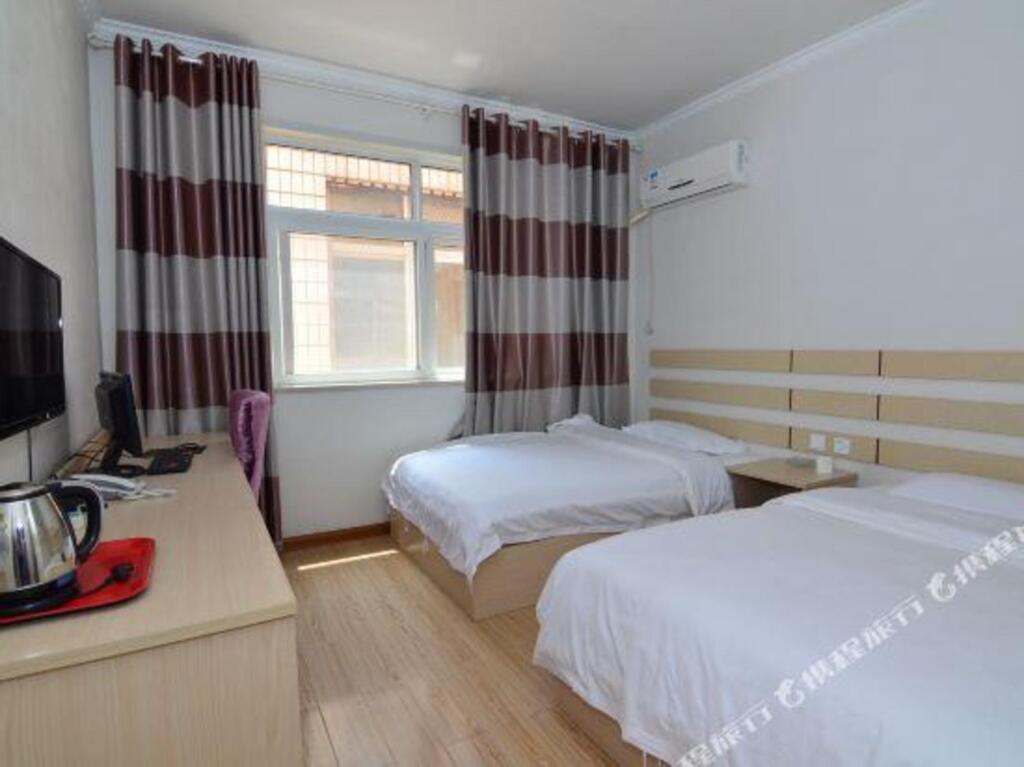 Циндао: Shengji Business Hotel