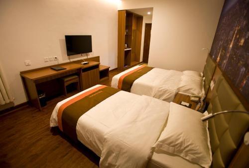 Хецзе: JUNYI Hotel Shandong Heze Dongming County Government Building