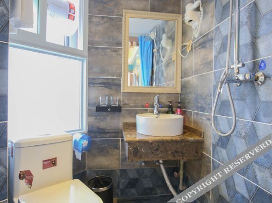 Мяньян: Qiziyuan Theme Apartment Hotel