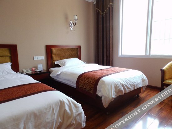 Лешан: Gaodeng Business Hotel
