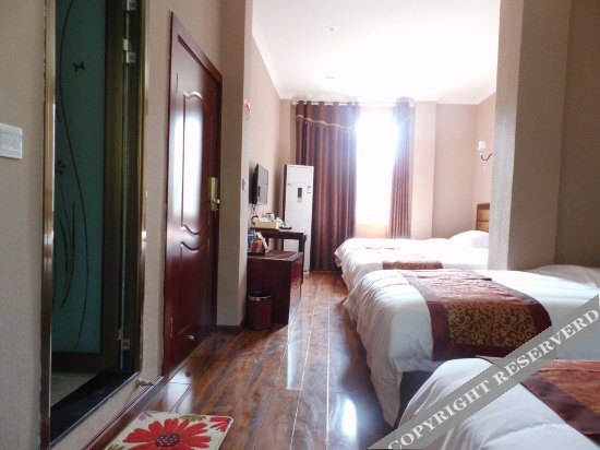 Лешан: Gaodeng Business Hotel