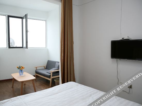 Цзинин: Jining Qiyue Apartment Hotel