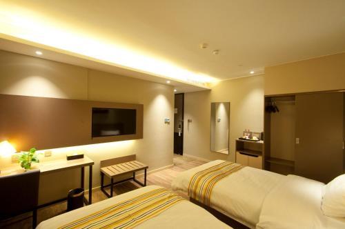 Жичжао: Home Inn Plus Rizhao Jinan Road International Finance Center
