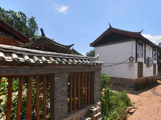 Lijiang Manmin Luo Boutique Inn — фото 1