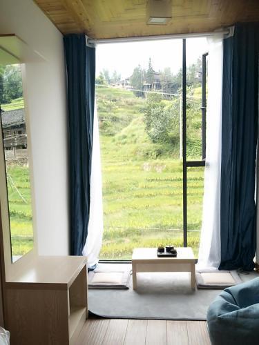 Longsheng: Longsheng Longji Puchuo Shengxiang Art Hotel