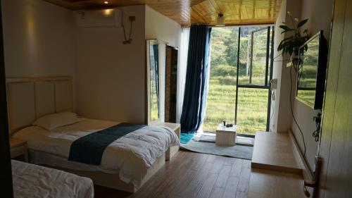 Longsheng: Longsheng Longji Puchuo Shengxiang Art Hotel
