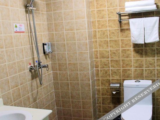 Лиаоченг: Yanggu Jinxi Business Hotel