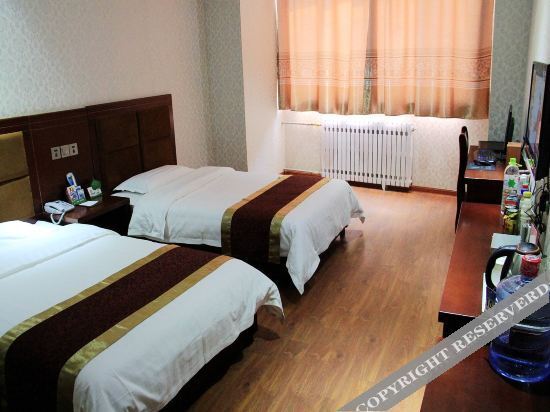 Лиаоченг: Yanggu Jinxi Business Hotel