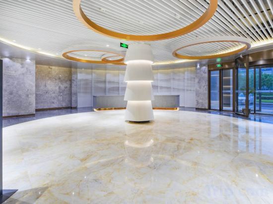 Manju Hotel (Huzhou Zhili Chinese children's wear city) — фото 1