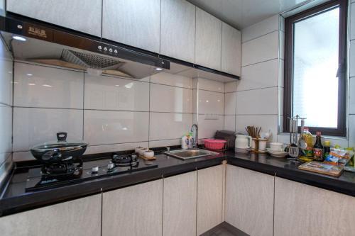 Wuhan Qinshan·Aoshan Century City· Locals Apartment 00135690 — фото 1