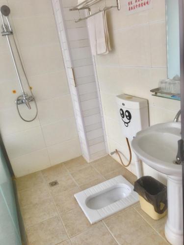 Дали: Dali Shuanglang Fu Lu Shou Xi Guesthouse