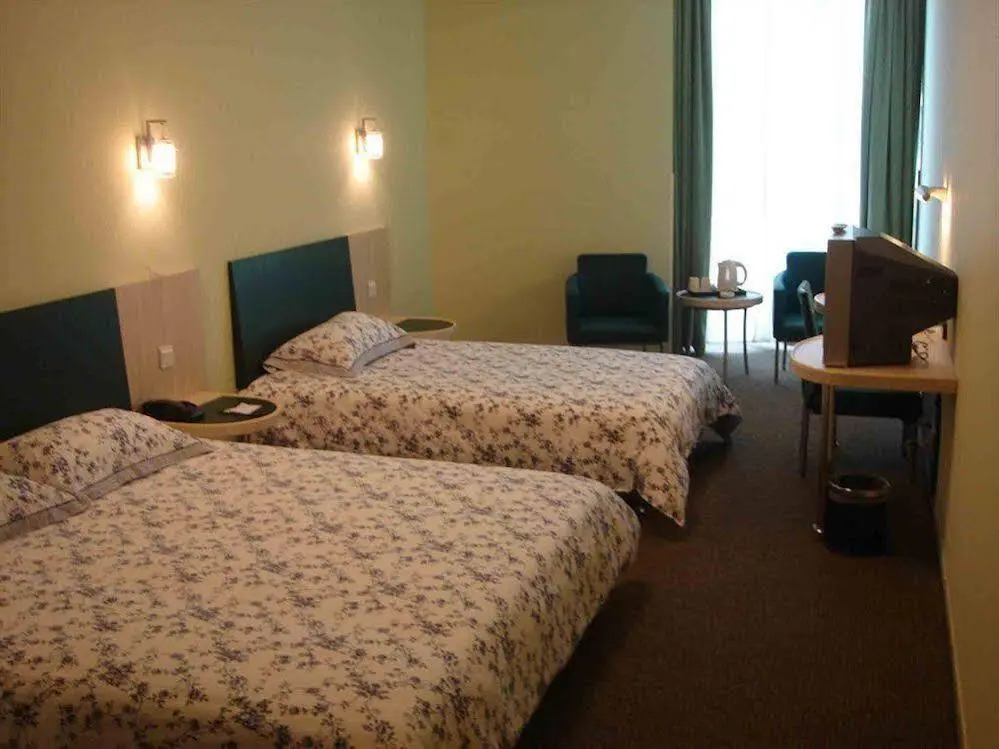 Шанхай: Motel168 Shanghai East JingLing Road Inn