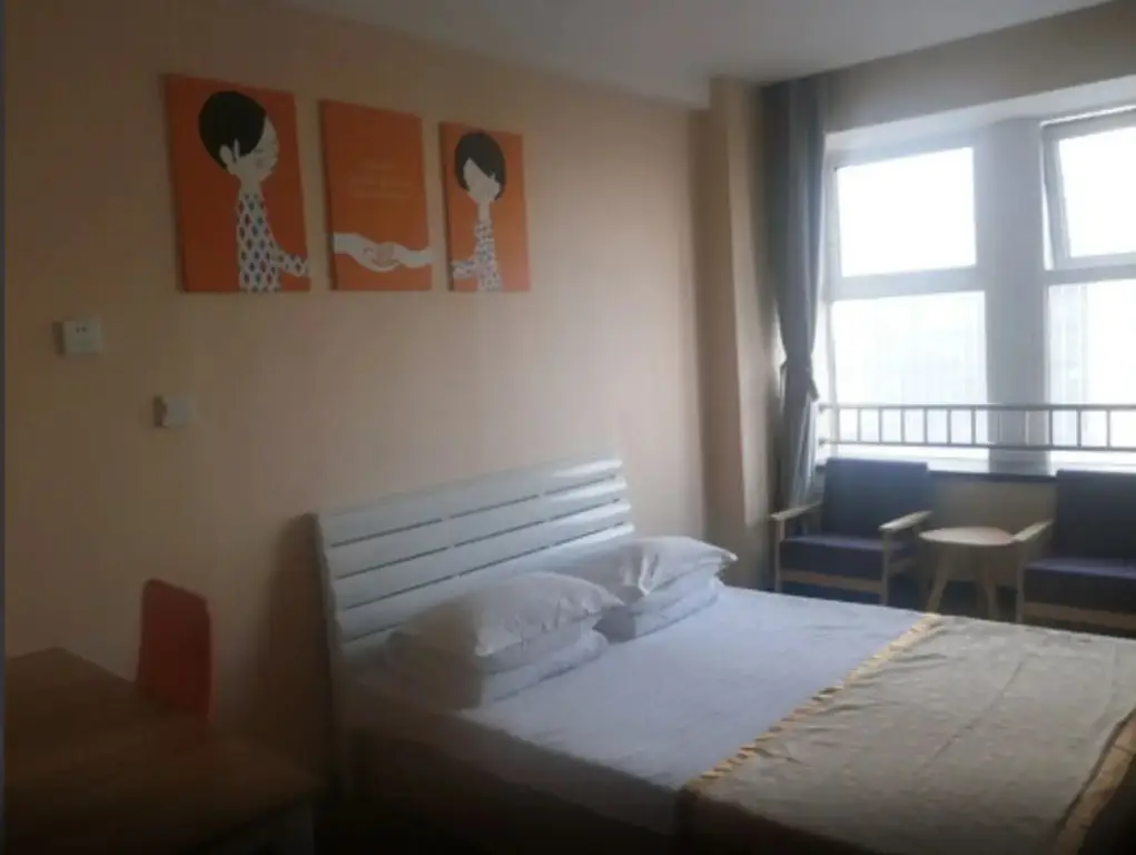 Циндао: Yanguitang Apartment Hongtai Branch