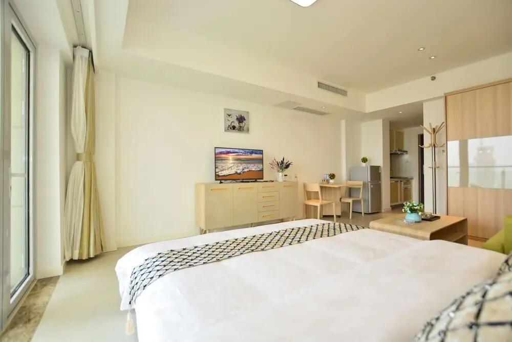 Циньхуандао: Qinhuangdao Tinghaiju Seaview Apartment