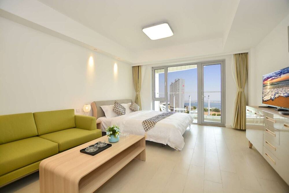 Циньхуандао: Qinhuangdao Tinghaiju Seaview Apartment