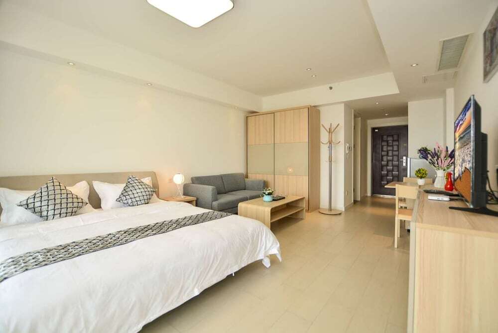 Циньхуандао: Qinhuangdao Tinghaiju Seaview Apartment