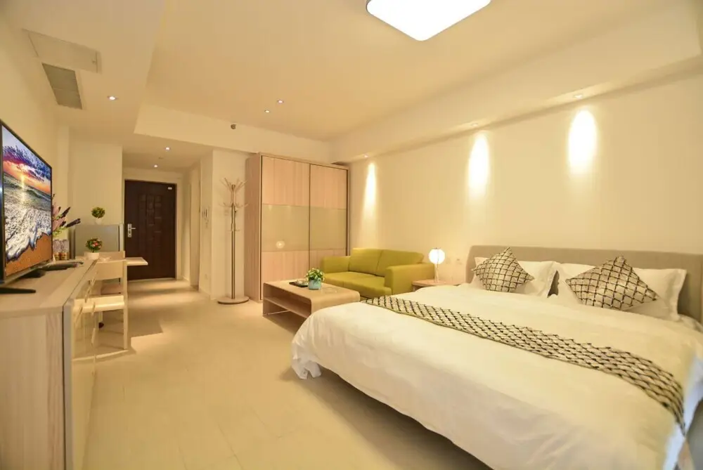 Циньхуандао: Qinhuangdao Tinghaiju Seaview Apartment