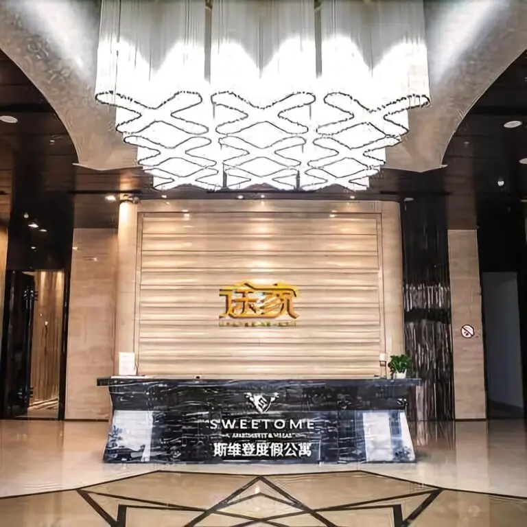 Циндао: Sweetome Golden Beach Wanli International Apartment